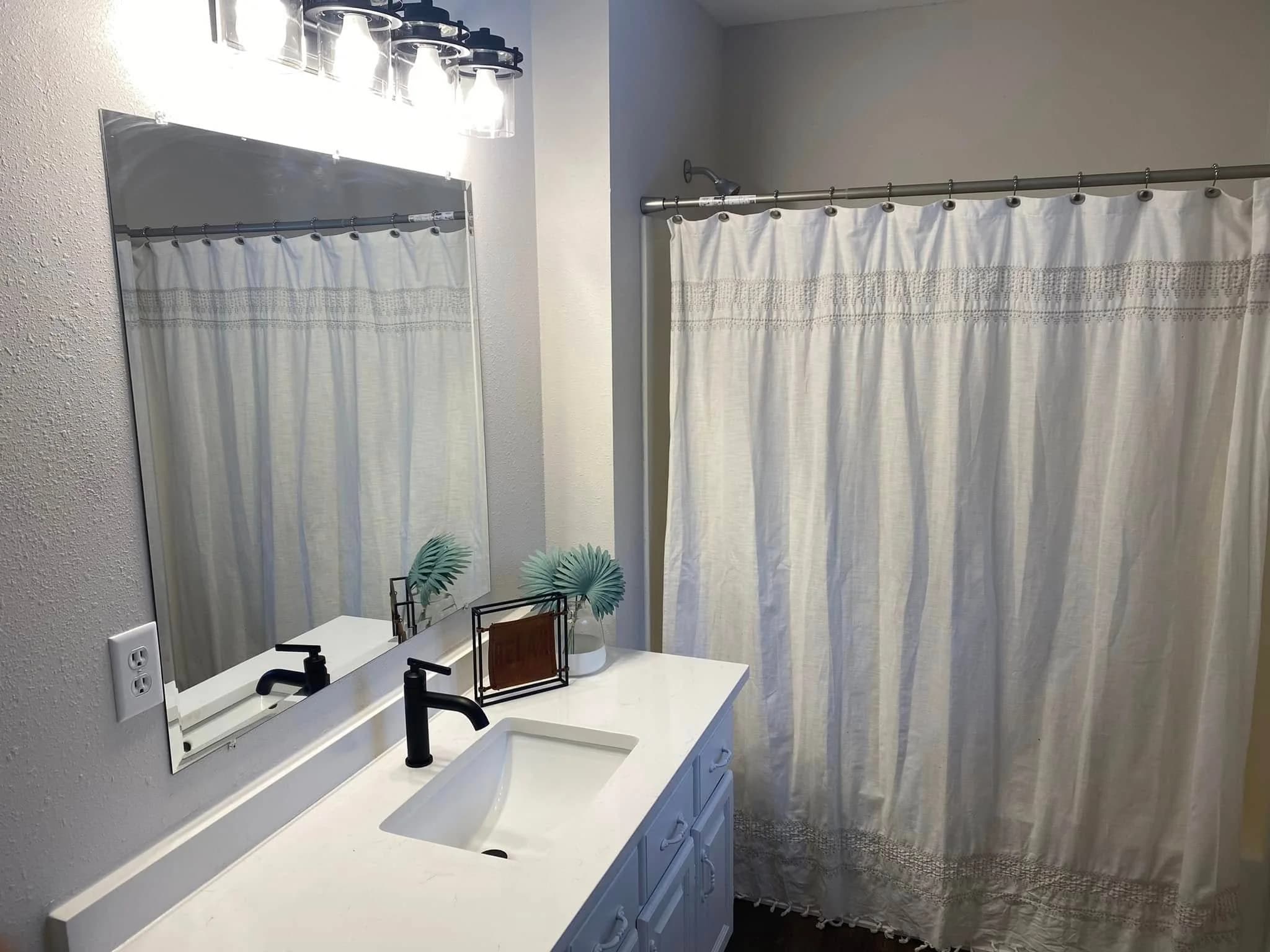 Bathroom remodel with quartz vanity in East Bethel, MN